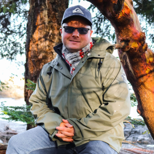 bryce williamson by a tree